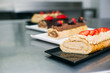 © Inuk Studio/Stocksy - Decorated sponge rolled cake on plate