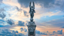 Brighton And Hove, Sussex, UK - January 2019: Peace Statue In Brighton And Hove During Sunset Under Dramatic Clouds