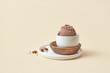 © Yaroslav Danylchenko/Stocksy - Chocolate ice cream and almonds