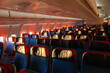 © Anna Berkut/Stocksy - empty airplane interior