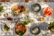 © Jayme Burrows/Stocksy - Overhead Still Life of an Outdoor Patio Lunch Spread