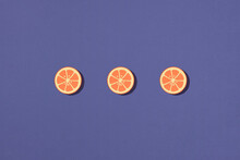 Three Orange Fruit Ring Slice Make From Paper