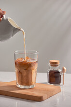 Iced Coffee With Pouring Milk 