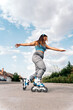 © Santi Nuñez/Stocksy - Woman on Roller Blades Dancing