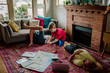 © Erin Brant/Stocksy - Young boy plans trip with map
