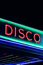 Illuminated Red Signboard Of Disco