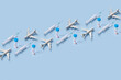 © Yaroslav Danylchenko/Stocksy - Planes, syringes and vaccine bottles