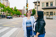 © Daniel Gonzalez/Stocksy - Two curvy girls in town