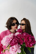 © Roman Shalenkin/Stocksy - Of A Non-Binary Man and Young Women With Makeup On