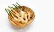 © Bowonpat - Young ginger in bamboo basket on white background.