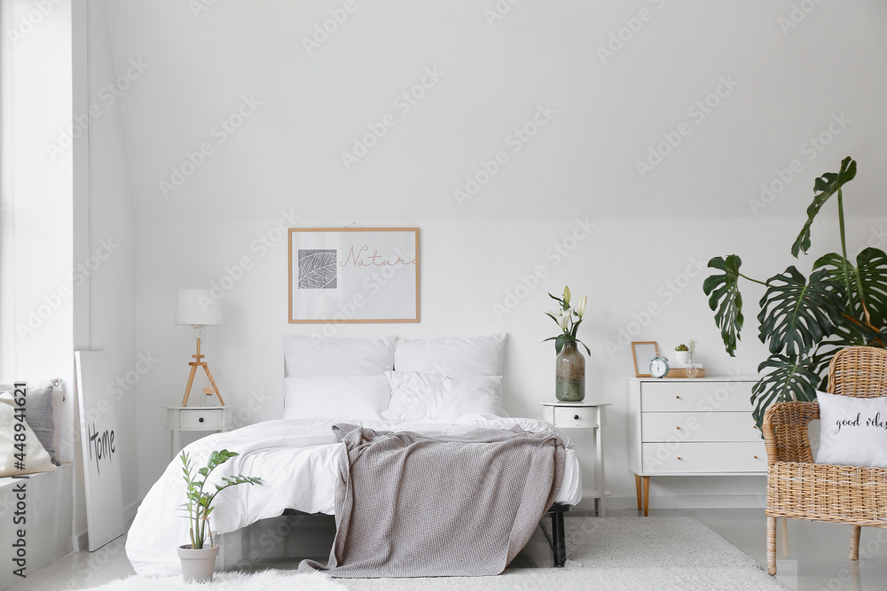 Interior of stylish bedroom with comfortable bed