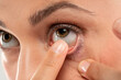 © vladimirfloyd - woman wearing contact lens