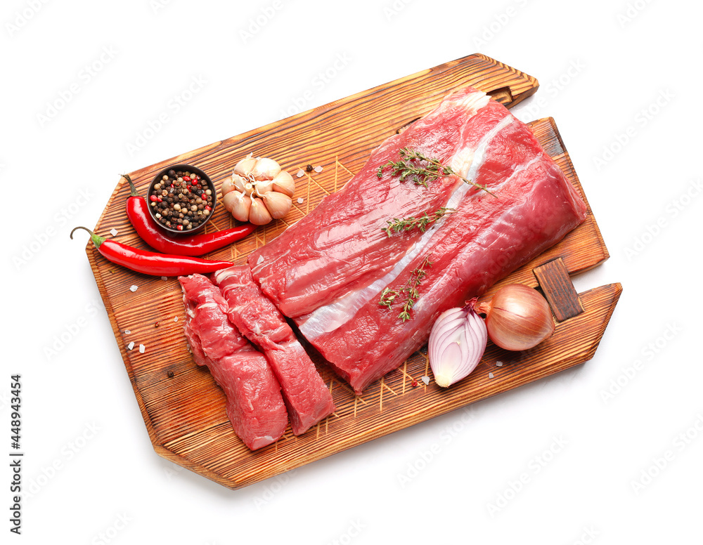 Wooden board with raw beef brisket on white background