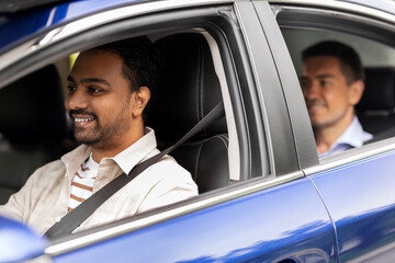 Poster - transportation, vehicle and people concept - happy smiling indian male driver driving car with passenger