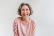 © lithiumphoto - Happy stylish mature woman on light grey background