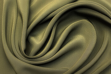 Wall Mural - Silk fabric crepe de chine in khaki in artistic layout. Texture, background. template.