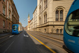 Fototapeta Paryż - Photographing trams in the middle of the road in the center of city of Zagreb in Croatia