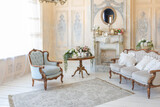 Fototapeta Kwiaty - luluxury rich sitting room interior in beige pastel color with antique expensive furniture in baroque style. walls decorated with stucco and frescoes