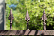 decorative spikes of the property fence