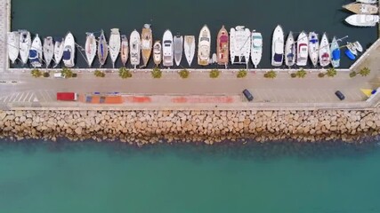 Sticker - An aerial view of boats parked in the harbor in HD