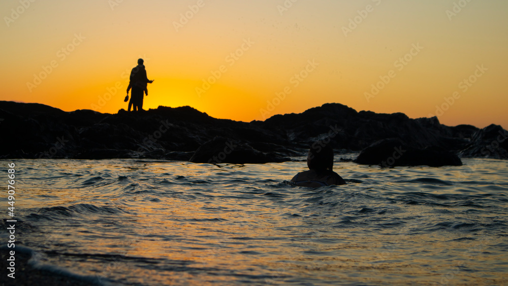 silhouette of a person on the beach