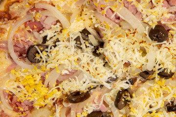 Brazilian Portuguese-style pizza with ham, egg, pepper, onion, mozzarella