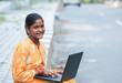 Portrait of Indian girl using Laptop for online class