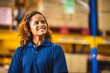 © chokniti - African American woman are work with business distribution inventory in warehouse factory, female people working in safety occupation job for shipping industry manufacturing