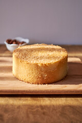 Sticker - Sponge cake on a wooden table.