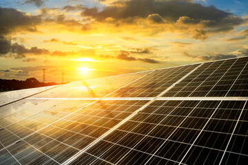 Solar power panels and beautiful natural landscape at sunset in summer in China