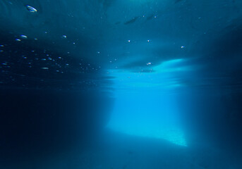 blue colored clear underwater surface texture with ripples  splashes and bubbles