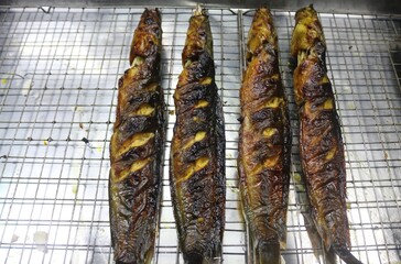 Poster - High angle shot of fried fish at the Phuket market