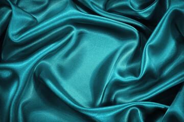 Wall Mural - Beautiful blue green silk satin background. Wavy soft folds. Luxurious silky fabric backdrop with space for product and design. Web banner.