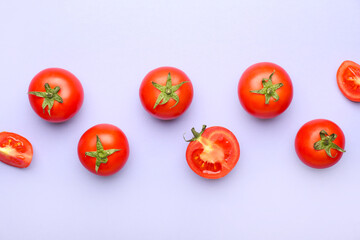 Fresh ripe tomatoes on color background