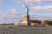 The Liberty Statue, NY, USA With New Jersey In The Background