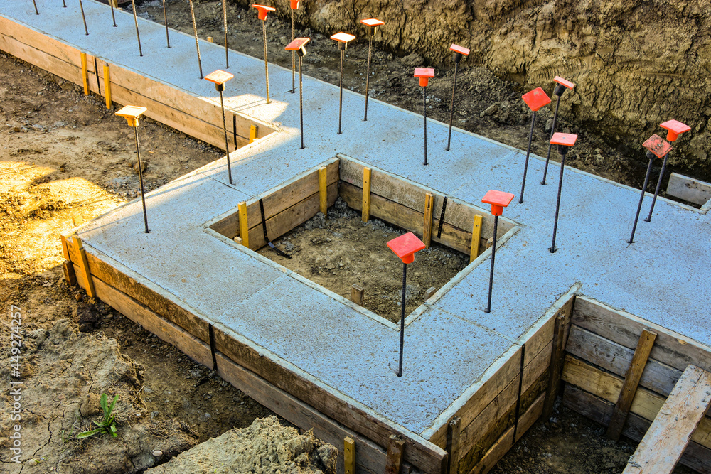 Footing Form Rods Wood forms, new concrete and re rod for footings for new commercial ...