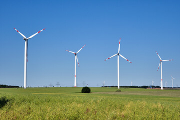 Wall Mural - Wind turbines in front of a clear blue sky seen in Germany