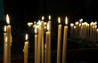 macro photo is groups of candles in the church
