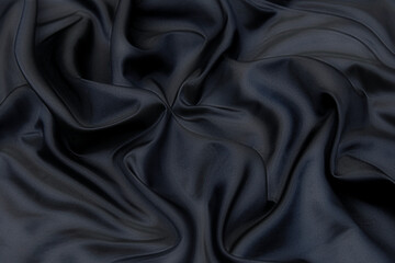 Wall Mural - Velvet silk or cotton or wool fabric tissue. Dark gray or black color. Texture, background, pattern.