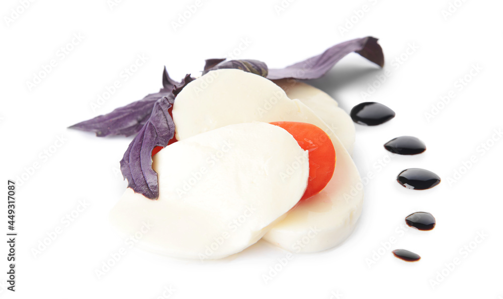 Fresh basil, tomato and mozzarella on white background