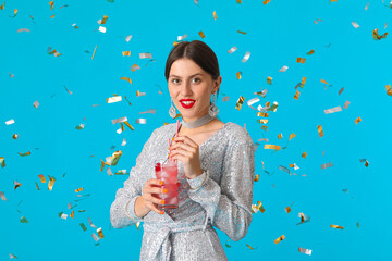 Poster - Beautiful young woman with cocktail on color background