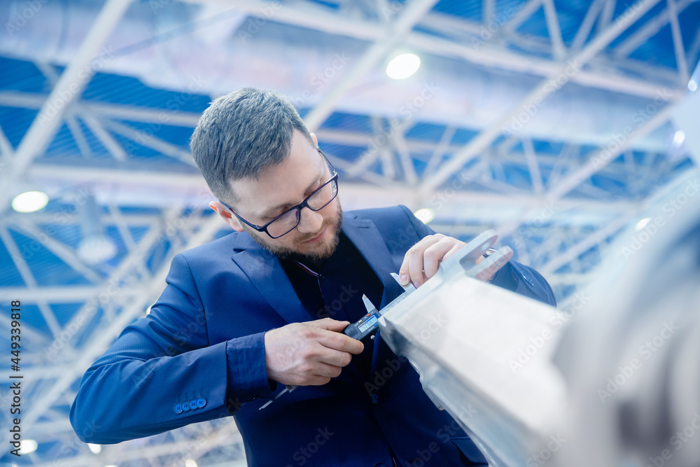 Engineering Checker Concept control quality manufactured products. Engineer checks ...