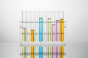 test tubes with color liquid in a acrylic stand. science and medical concept.