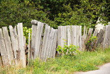 Old Broken Wooden Fence At Countryside