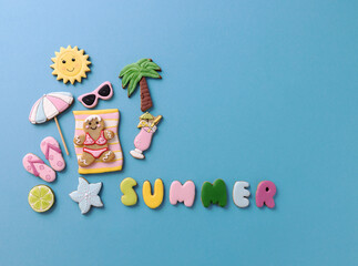 Wall Mural - Gingerbread woman enjoying summer with her tropical beach theme cookie friends