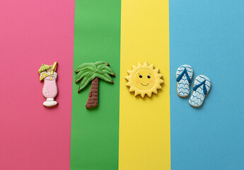 Wall Mural - Tasty cookies in various shapes, cocktail, sun, palm tree and thong slippers, summer fun