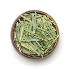 Top view of dried lemongrass herb in wooden bowl