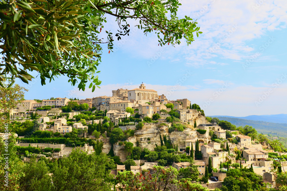 A view of the medieval, hilltop village of Gordes in the Vaucluse department of Provence,  France. - obrazy, fototapety, plakaty 