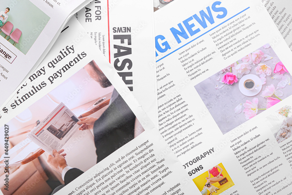 Different newspapers as background, closeup