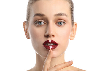 Sticker - Beautiful young woman with hearts on lips against white background